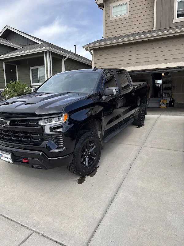 Black Chevrolet truck photographed by Carlos Galvan